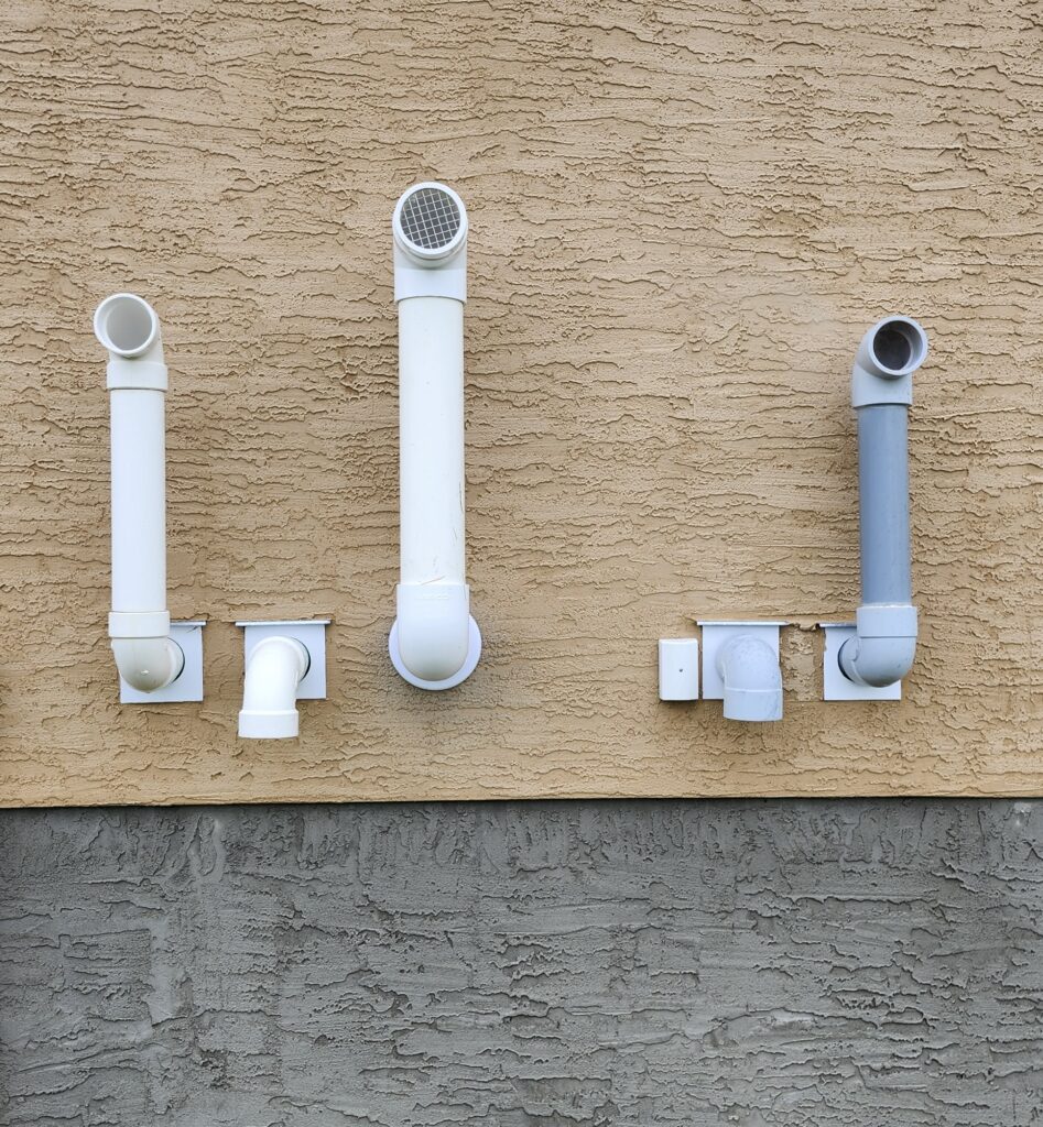 Radon mitigation system discharge vent to display removable vermin cap and screen